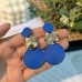 Metal style geometric circular earrings with pleated contrasting color earrings and earrings