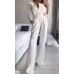 Jumpsuit with diagonal collar and mid waist