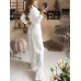 Jumpsuit with diagonal collar and mid waist