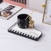 Creative trace golden note shape handle ceramic cup saucer Nordic exquisite mug Creative trace golden note shape handle ceramic cup saucer Nordic exquisite mug