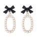 Korean black bow pearl elegant teenage temperament, light luxury, high-end design sense earrings and earrings