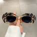 Elliptical small frame sunglasses with cloud shaped trendy and quirky 3D pattern sunglasses