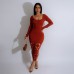 Solid color round neck long sleeved hollow wrap buttocks high waisted dress