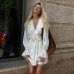 V-neck pleated flared sleeves with ruffled edges, white dress with women's design feeling fluffy skirt