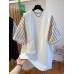 Versatile casual age reducing western-style mid length contrasting color patchwork T-shirt