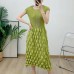 Bubble pleated sleeve cinched waist pleated mid length skirt