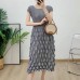 Bubble pleated sleeve cinched waist pleated mid length skirt