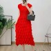Bubble pleated sleeve cinched waist pleated mid length skirt