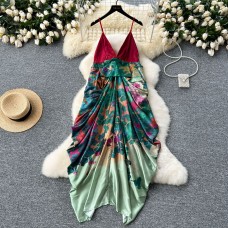 Unique and niche vacation dress with women's design sense, V-neck pleated irregular print, contrasting color vacation flower bud long skirt