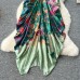 Unique and niche vacation dress with women's design sense, V-neck pleated irregular print, contrasting color vacation flower bud long skirt