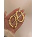 INS new metal smooth oval hollow earrings French retro irregular exaggerated personality earrings