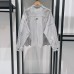 Black and white striped small stand up collar gold buckle decoration off shoulder sleeves casual shirt