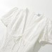 V-neck waist cinching mini skirt with hollow embroidery bubble sleeves and short skirt
