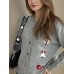 Round neck long sleeved knitted cardigan women's new three-dimensional decoration versatile loose sweater women