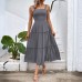 Pulling straps and sleeveless dress