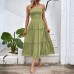 Pulling straps and sleeveless dress