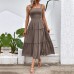 Pulling straps and sleeveless dress