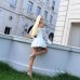 One shoulder flared long sleeved dress with slimming and pleated A-line short skirt