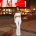 Hanging neck long sleeved top with hollowed out waist and micro flared long pants two-piece set