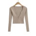 V-neck long sleeved elastic waistband top