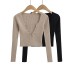 V-neck long sleeved elastic waistband top