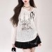 Printed straps with hollowed out loose long sleeves