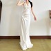 Hanging neck slim fit V-neck sleeveless backless solid color hip hugging jumpsuit for women