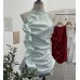Sleeveless ruffled three-dimensional flower top