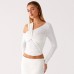 Solid color twisted asymmetrical design long sleeved slim fit top for women's clothing
