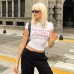Letter printed round neck pullover short sleeved crop top with exposed navel