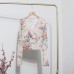 Tie dye printed cross V-neck floral top