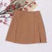 Irregular high waisted pleated anti glare short skirt with hip coverage