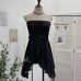 Sleeveless top with strapless folds waist cinching and slit design