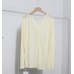 Loose twisted slit thin long sleeved top for women