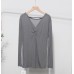 Loose twisted slit thin long sleeved top for women