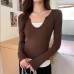 Splicing and contrasting fake two-piece long sleeved top for women
