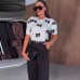 Round neck bow embellished short sleeved pullover knitted sweater