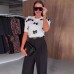 Round neck bow embellished short sleeved pullover knitted sweater