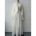 Dress design with a cinched waist and long sleeves