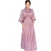 Dress design with a cinched waist and long sleeves