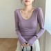 U-neck long sleeved waist cinching slim fit top