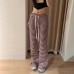 Striped micro flared floor pants