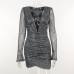 Deep V-ring chest revealing pleated long sleeved hip hugging skirt