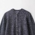 Round neck nine sleeves single breasted solid color knitted sweater for women