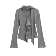 Irregular base top with ruffle edge and ribbon