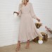 Stand up collar long sleeved solid color jumpsuit long skirt with belt
