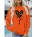 Featuring a leopard print heart-shaped design pattern