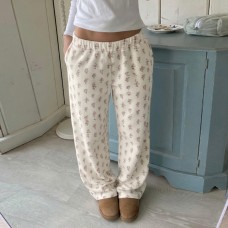 Double sided plush knitted pants with floral patterns