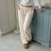 Double sided plush knitted pants with floral patterns