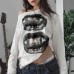 Printed off shoulder loose and lazy solid color long sleeved top